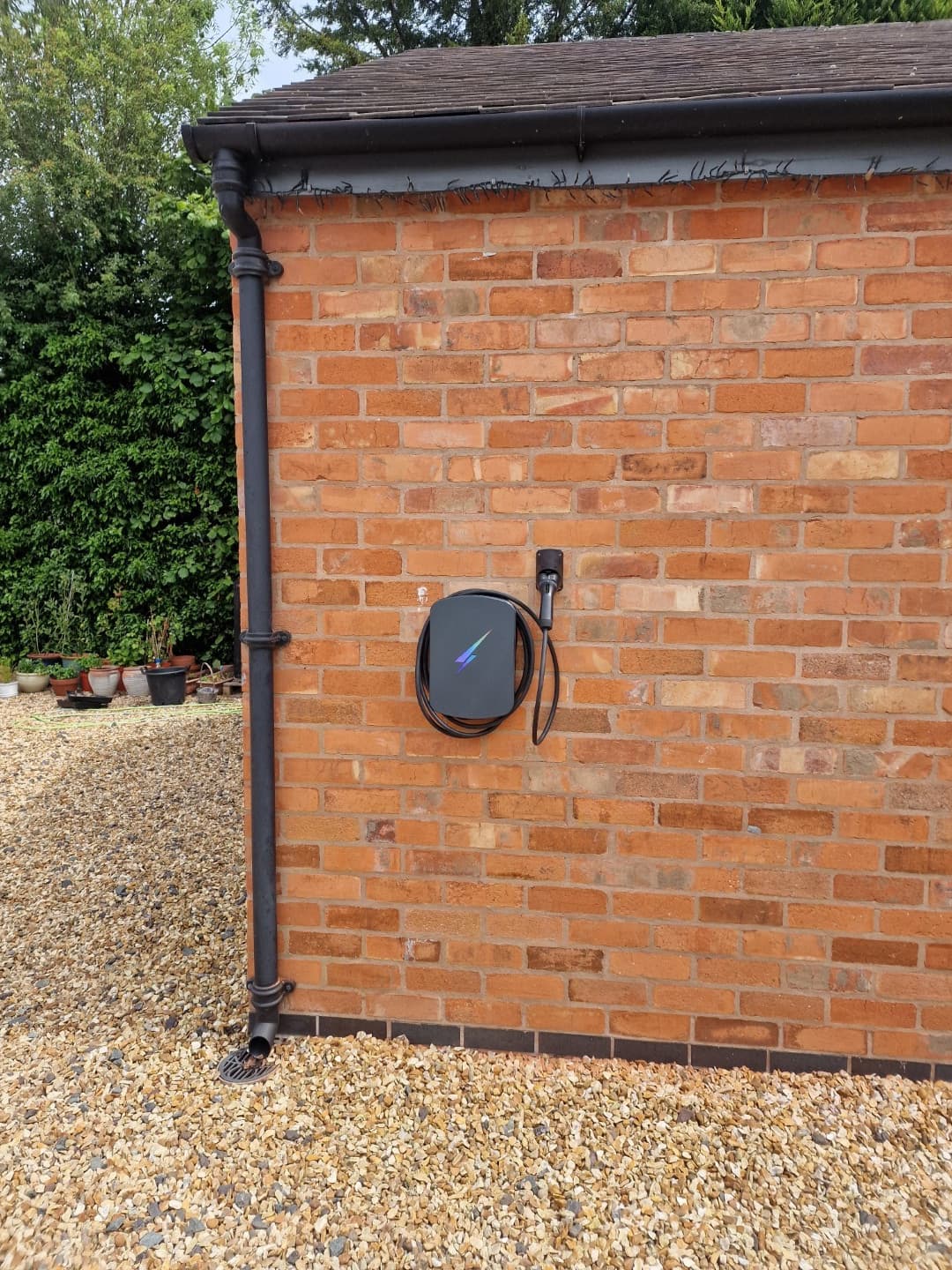 Hypervolt Home 3 Pro installed on rendered wall with neat cable route