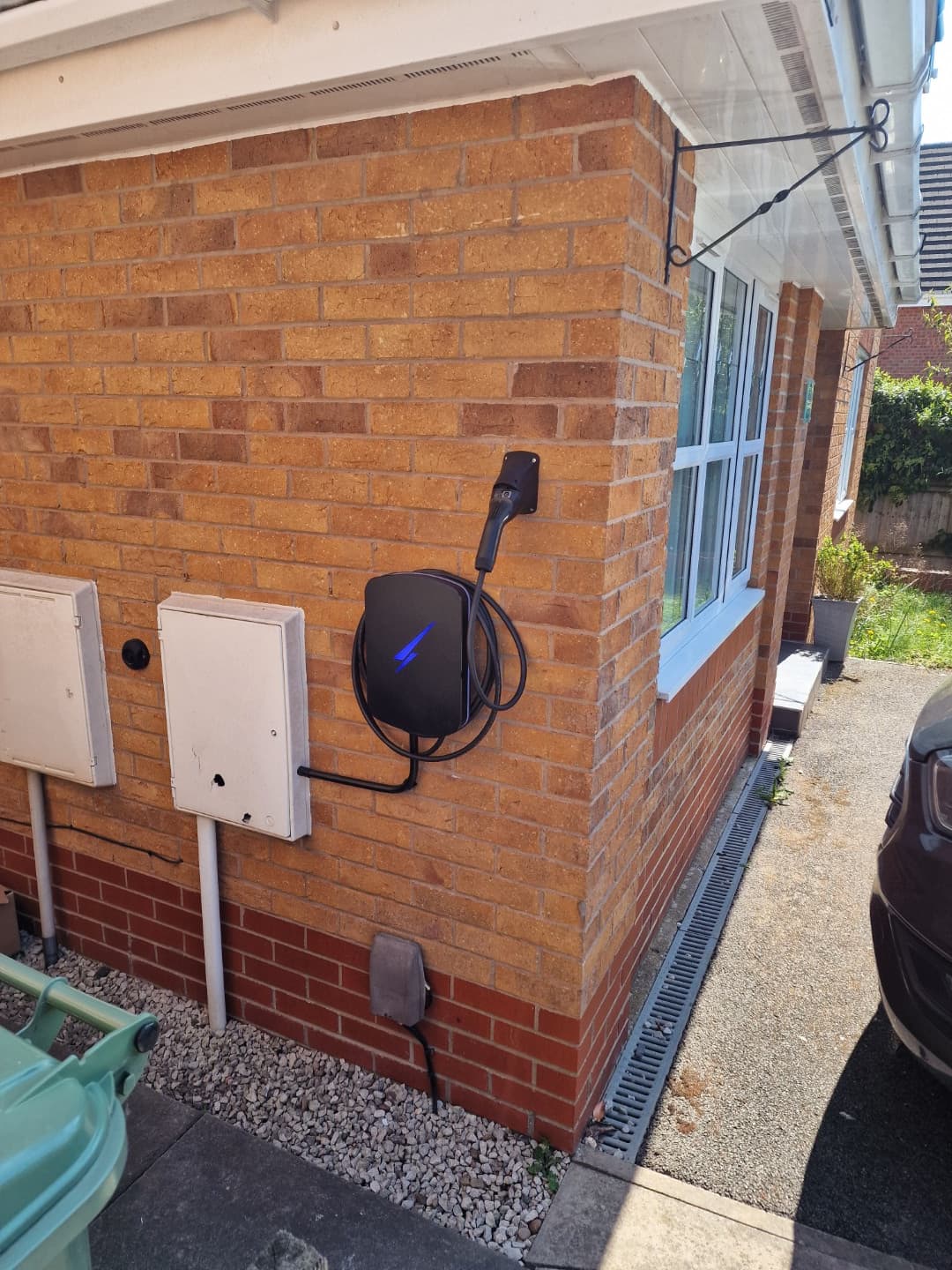 Hypervolt Home 3 Pro installation showing cable run and holster position