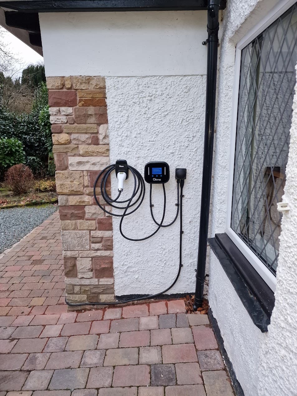 Ohme Home Pro installed on exterior wall showing overall placement